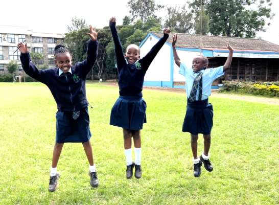Girls celebrating at school